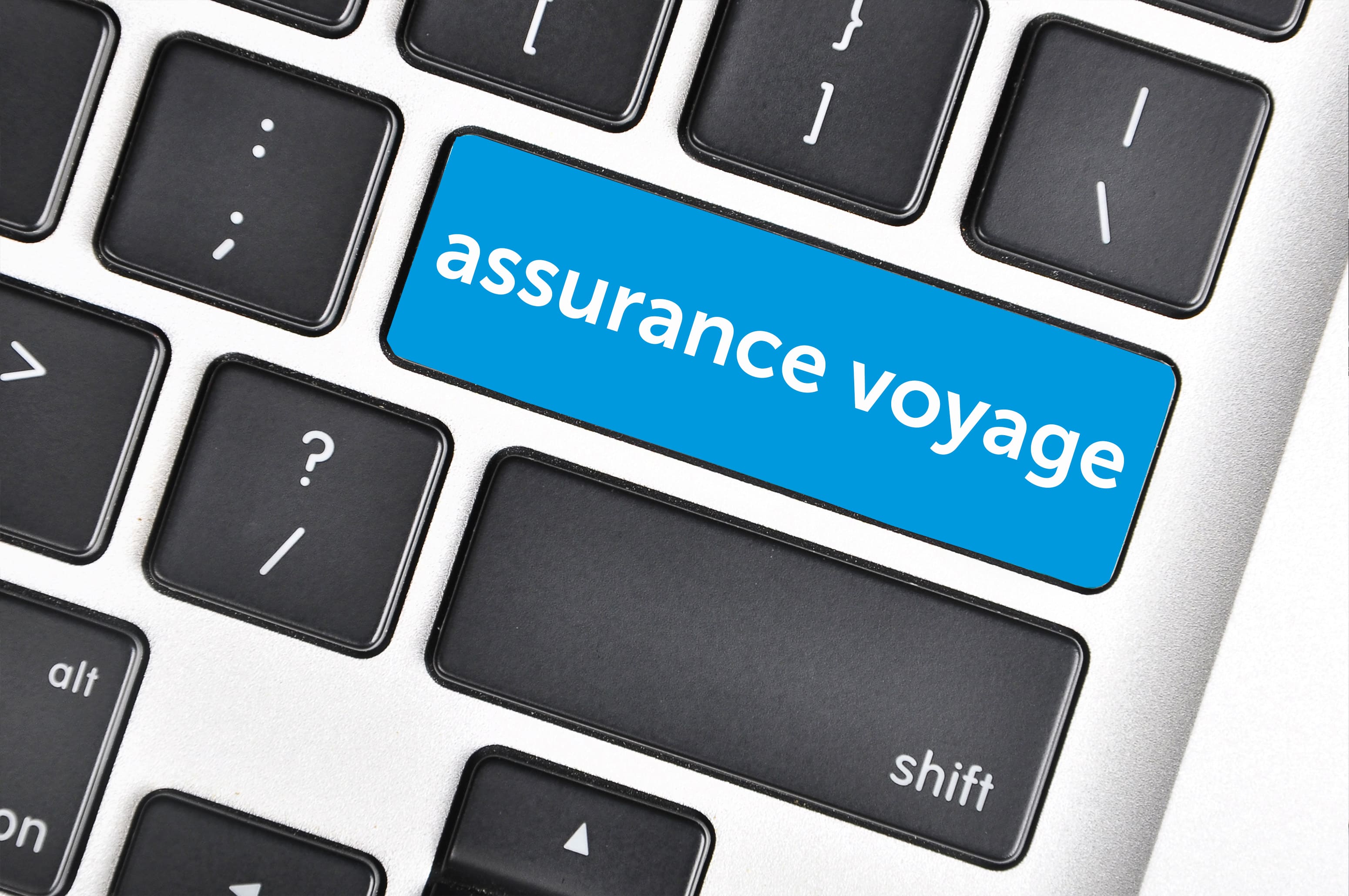 Bouton écrit assurance voyage dessus